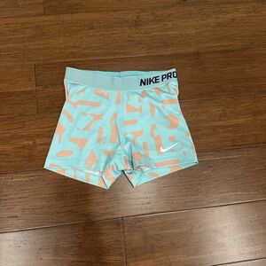 Nike pros Size S. Color: Blue and Orange.